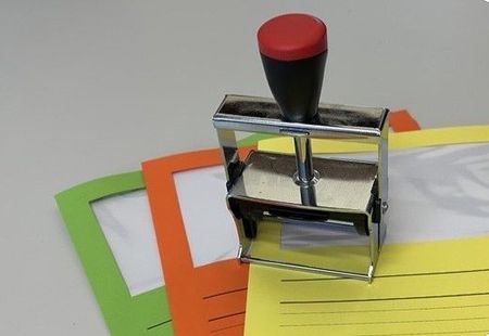 Stempel auf Sichtmäppchen
